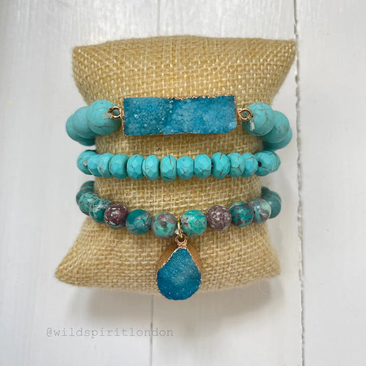 A set of 3 bright bright blue bracelets made with blue Howlite and Imperial jasper stones