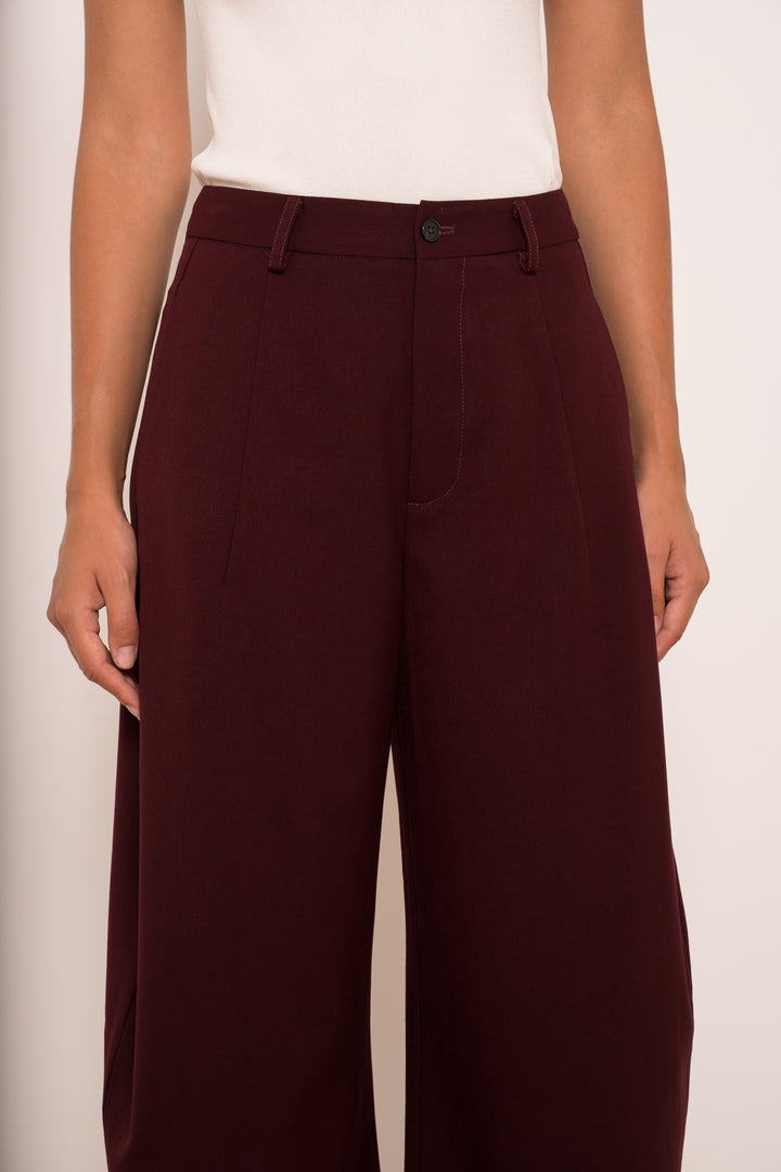The Carmen Tailored Barrel Leg Trousers in Navy Blue - Plum