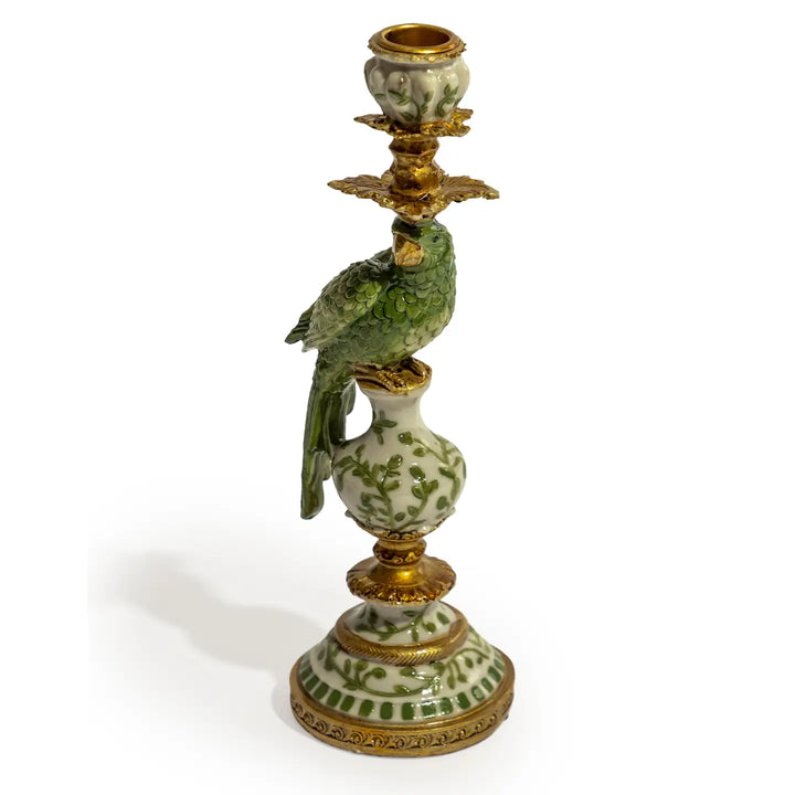 An ornate vintage-style porcelain candlestick holder featuring a green bird perched on a white and green patterned vase, topped with gold-tone metal candle cups and a decorative base.