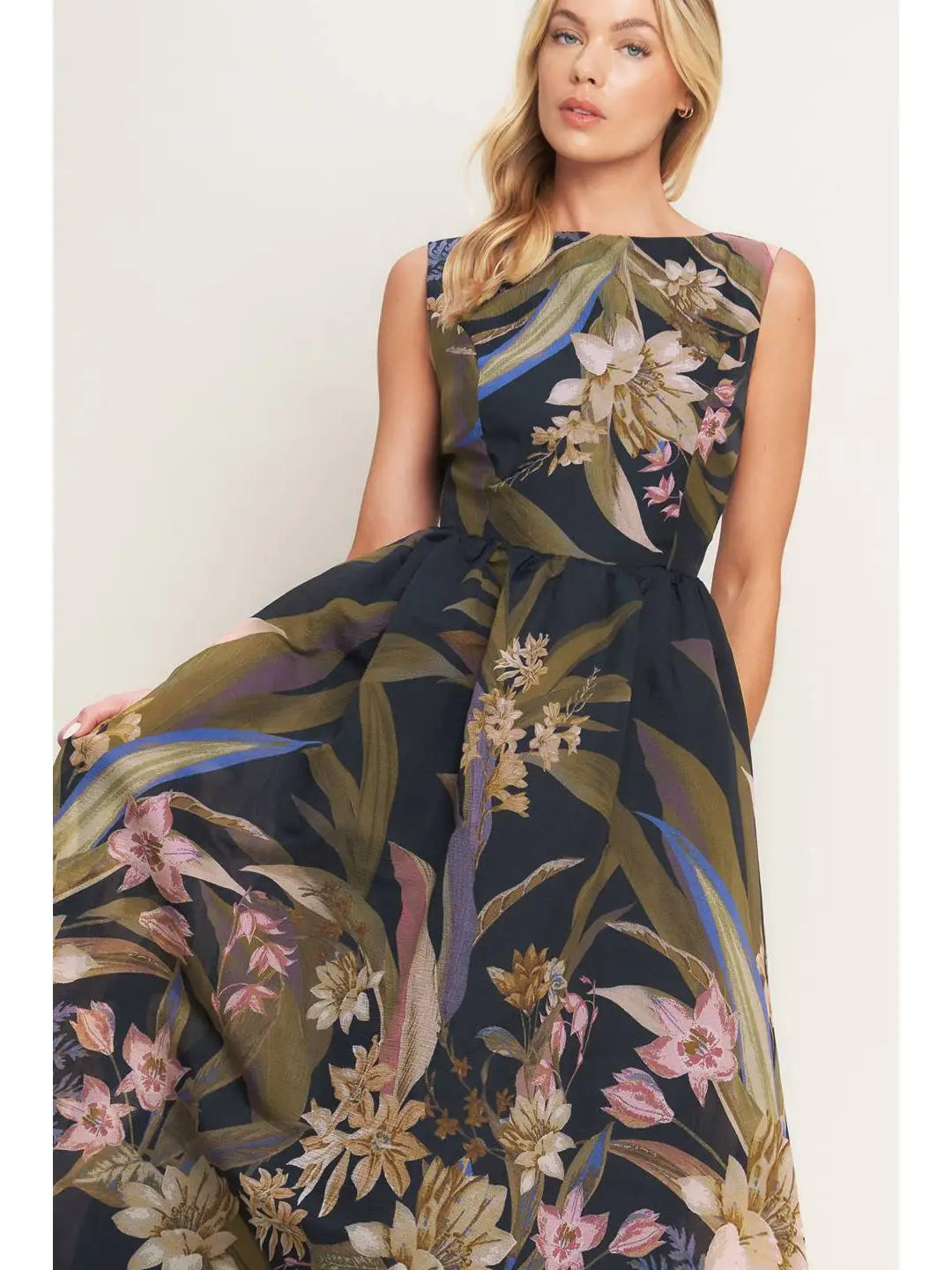 Woman wearing a floral dress with a white background