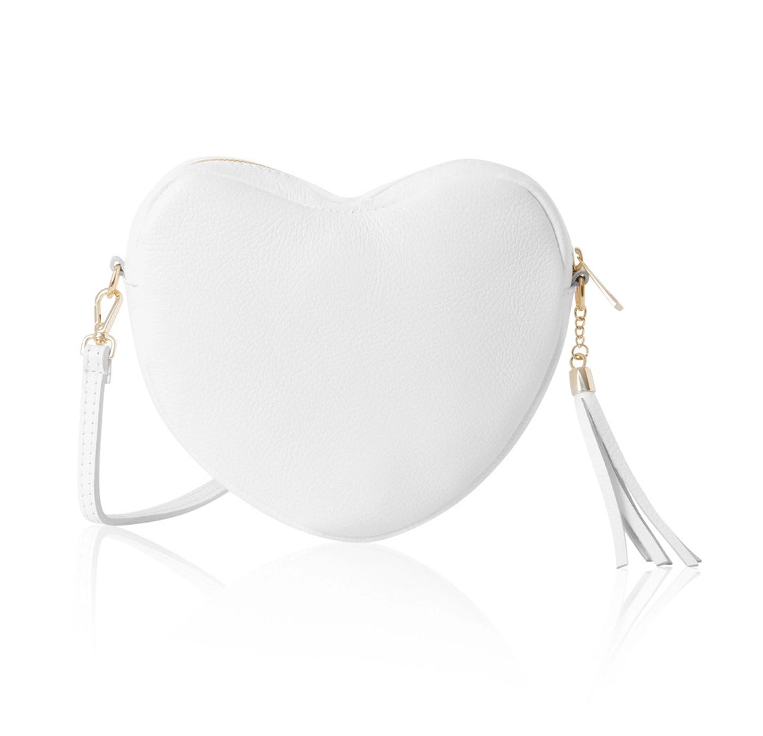 Heart-shaped white handbag with gold accents on a white background