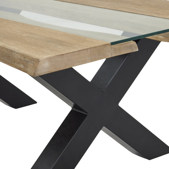 Close-up of a modern table with wooden top and black metal legs on a white background