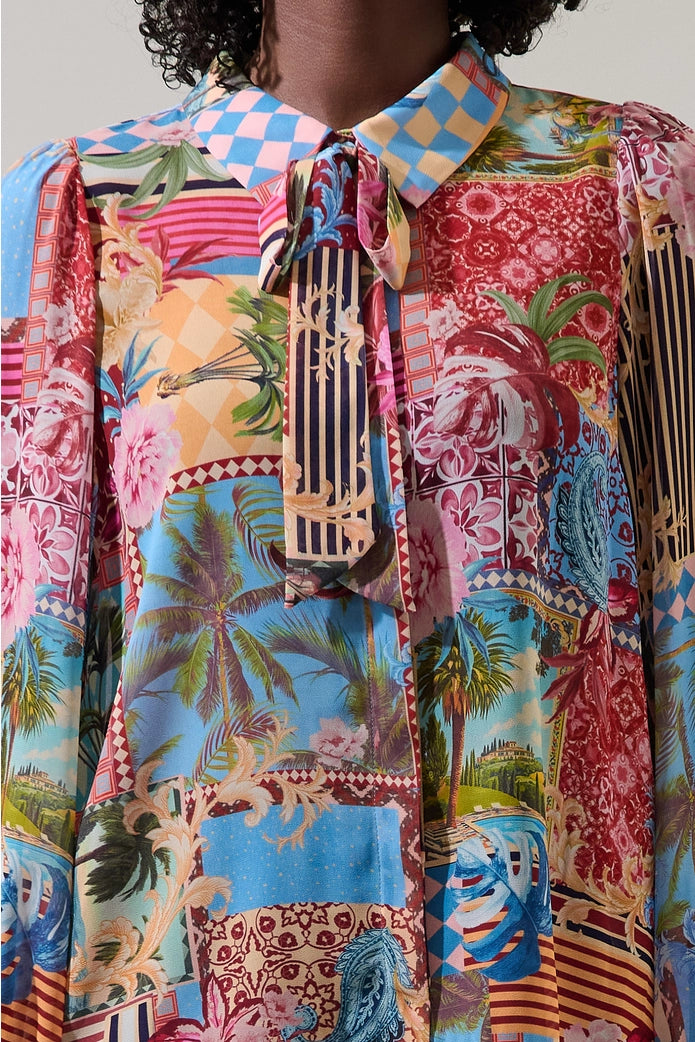 Colorful patterned shirt with a mix of tropical and abstract designs.