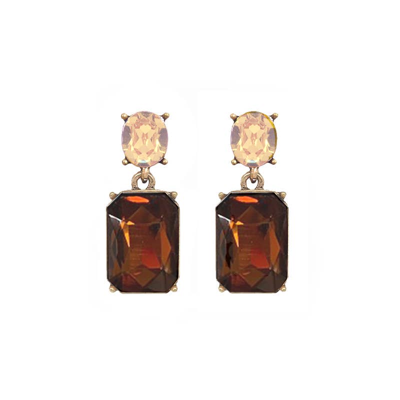 Pair of earrings with gemstones on a white background
