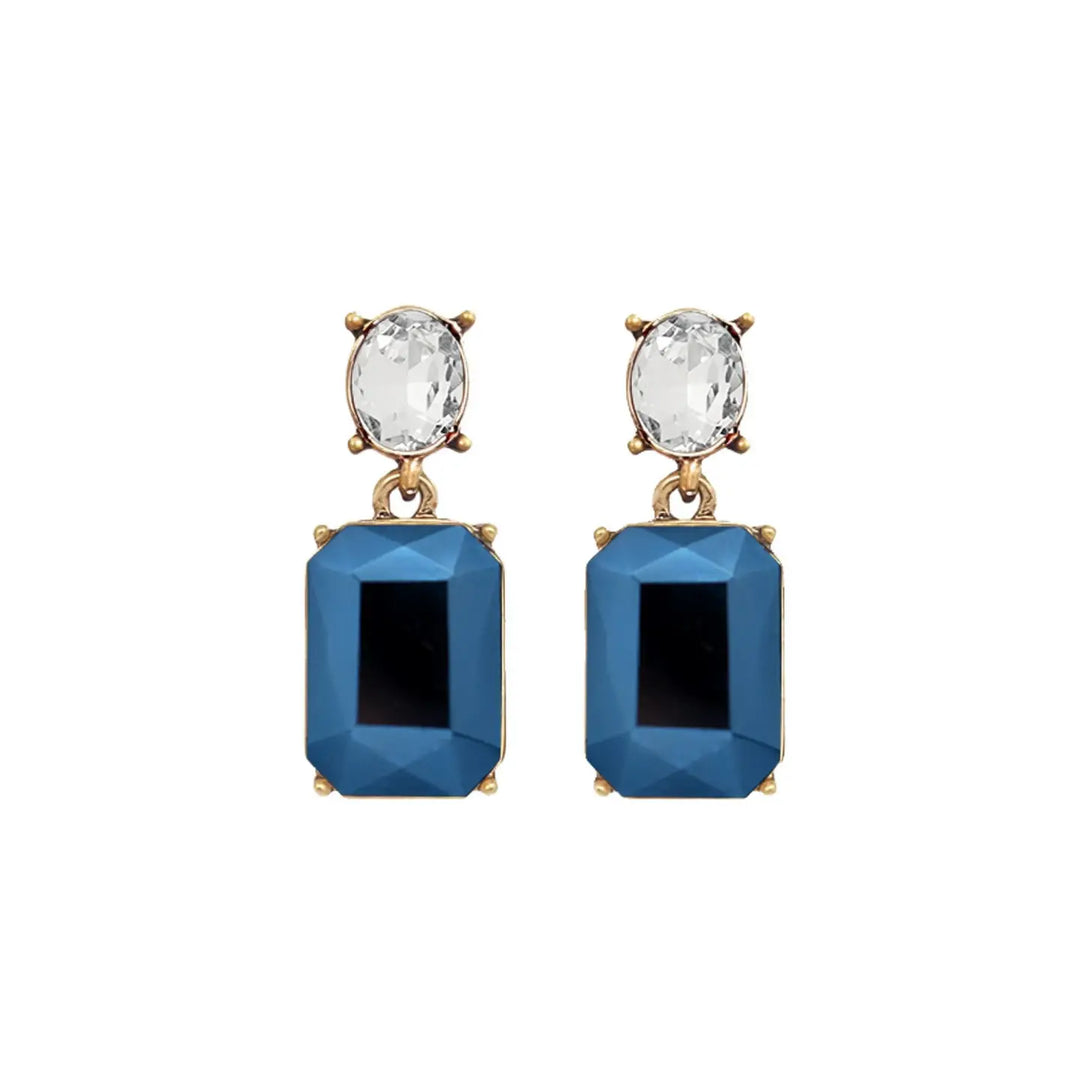 Jewelry by Samy earrings with floral design on a white background