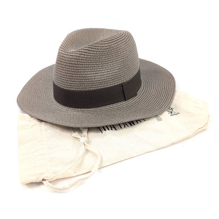 mocha straw hat with a brown band on a white background