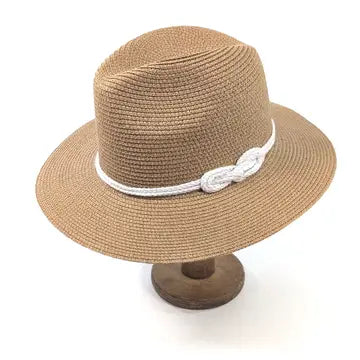 Beige straw hat with a white band on a white background