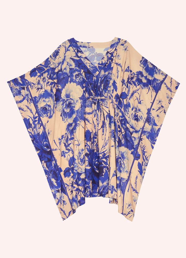 Blue and beige floral patterned dress on a white background