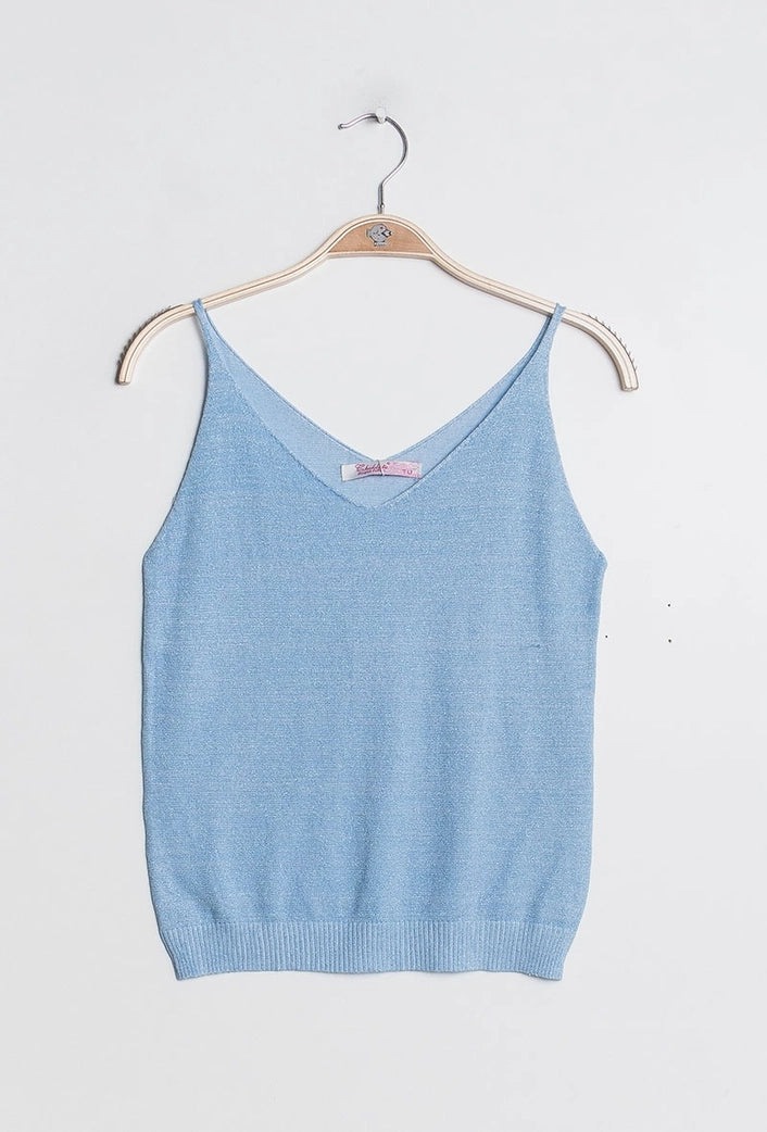 Light blue tank top on a hanger against a white background