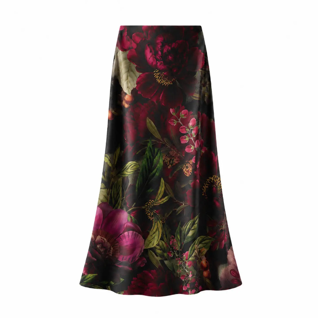 A high-waisted, A-line midi skirt featuring a rich, dark floral print with peonies and roses in deep red, magenta, and green on a black satin-like background, shown against a plain white studio backdrop.