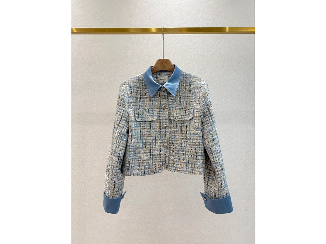 Plaid jacket with blue collar and cuffs on a white background
