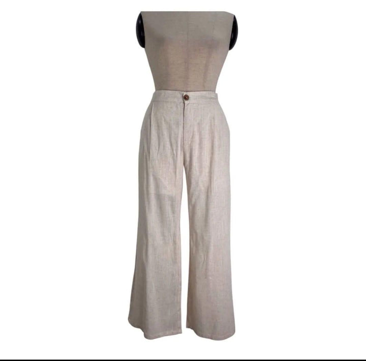 Mannequin wearing beige wide-leg pants on a white background