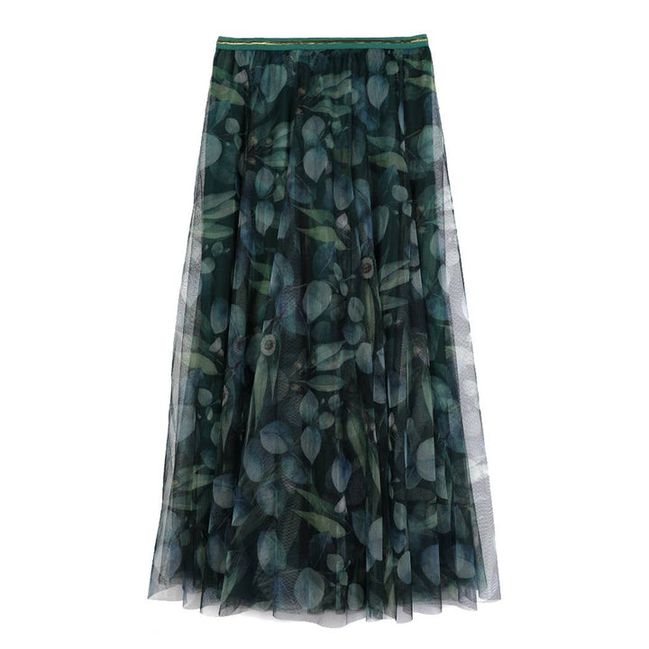 Green floral patterned skirt on a white background