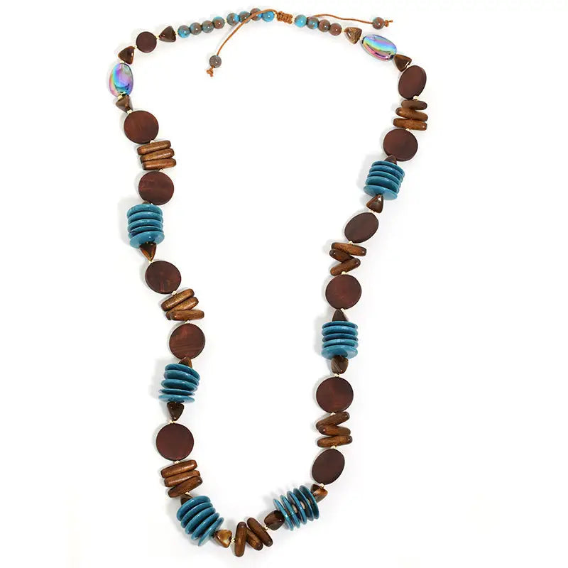 Necklace with brown and blue beads on a white background