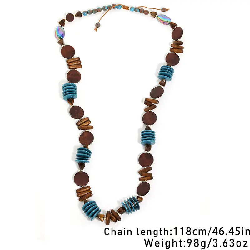 Necklace with wooden and blue beads on a white background