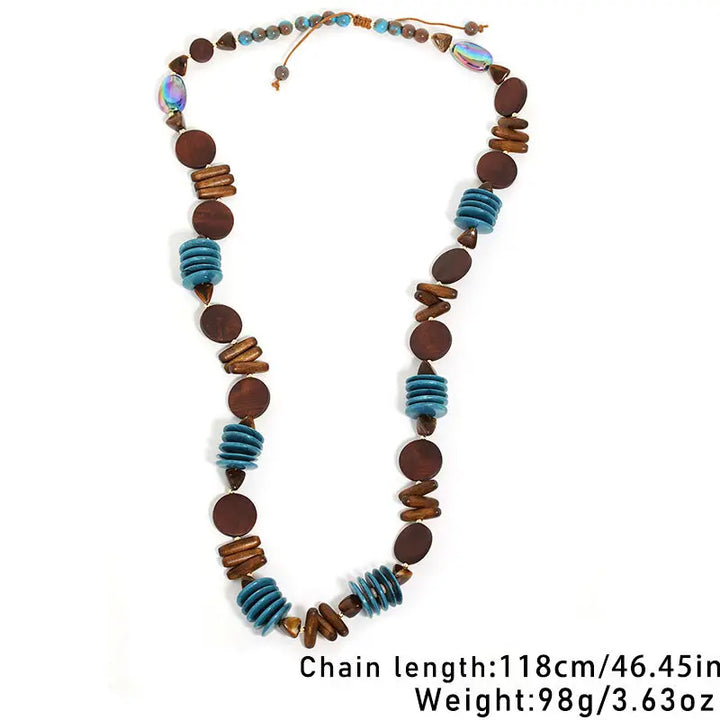 Necklace with wooden and blue beads on a white background