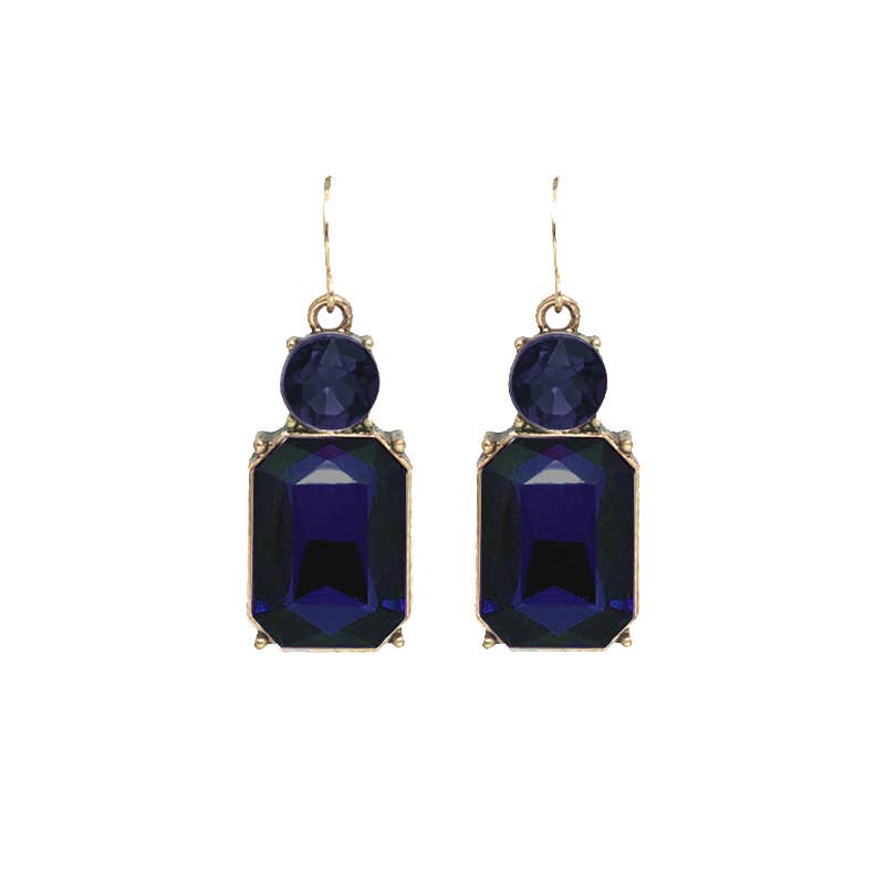 Pair of blue gemstone earrings on a white background