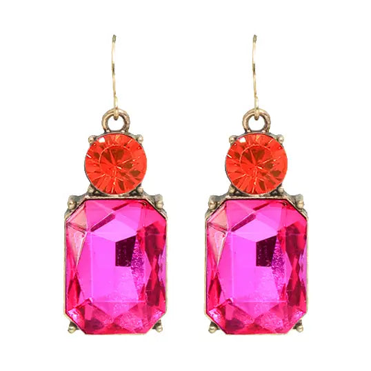 Pair of earrings with pink and orange gemstones on a white background