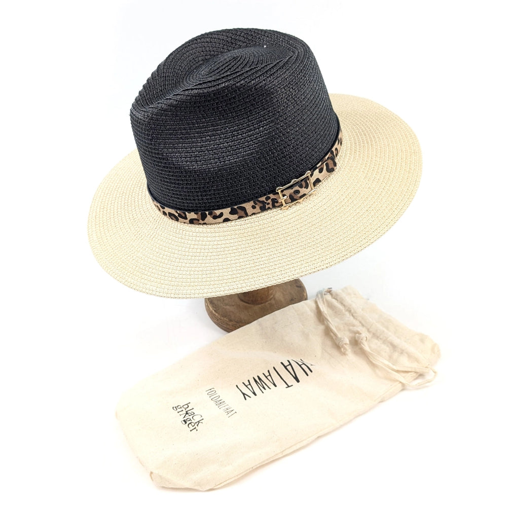 Black and beige straw hat with leopard print band on a white background