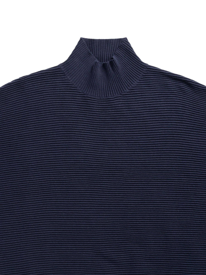Navy ribbed knit sweater on a white background