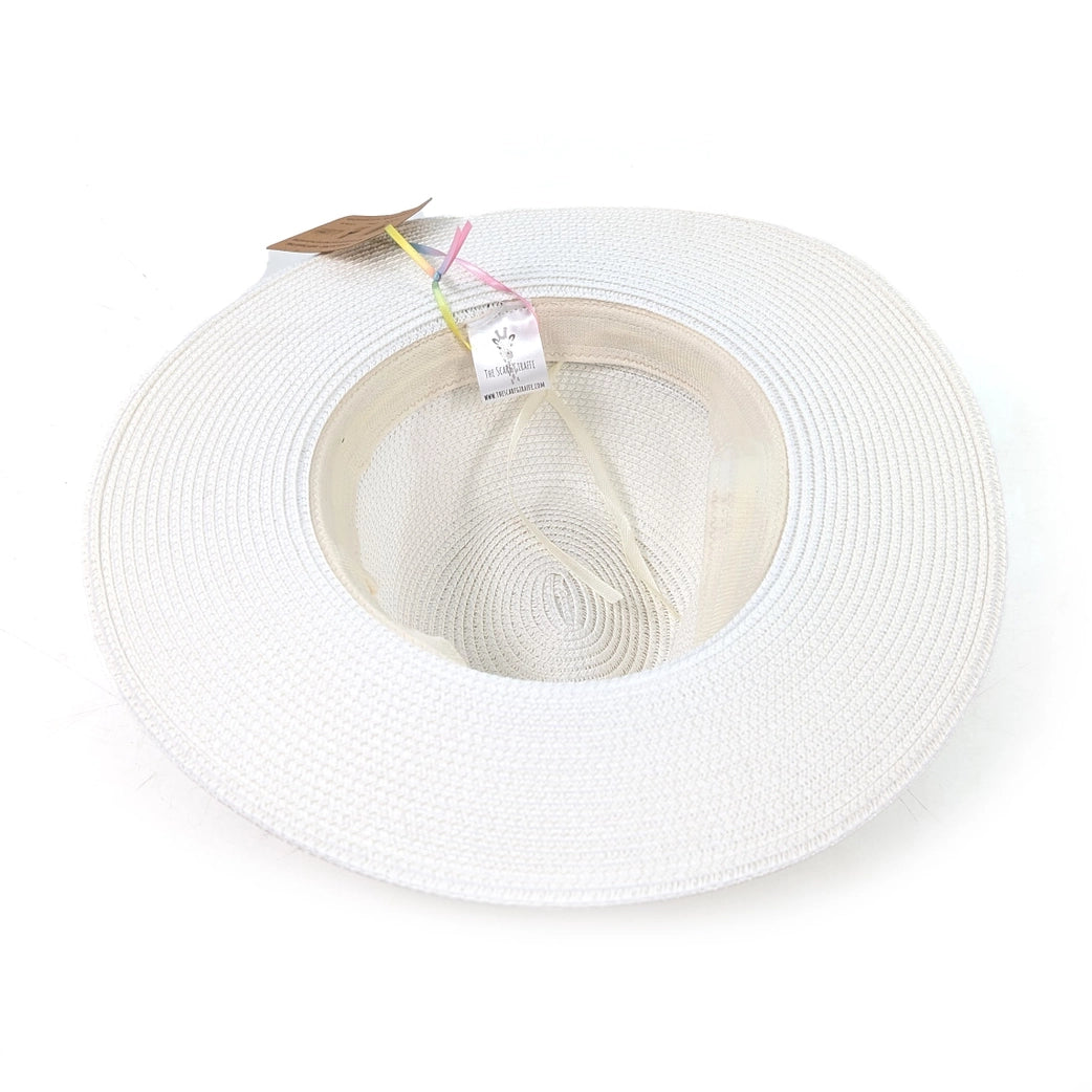 White straw hat with a tag on a white background